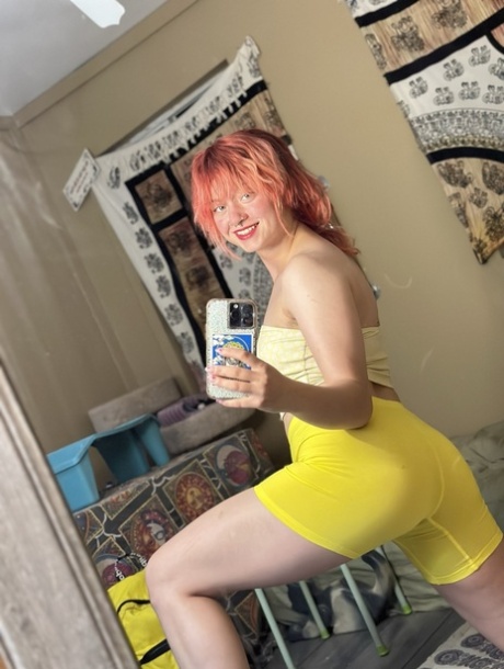 thick redhead bondages a stud and plays with him nude pic