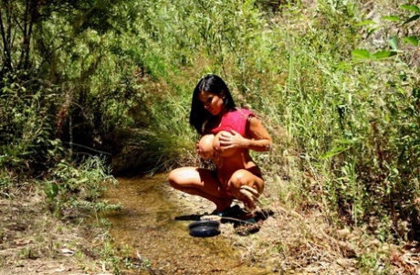 voluptuous oriental stimulates her twat with a rock hard toy naked gallery